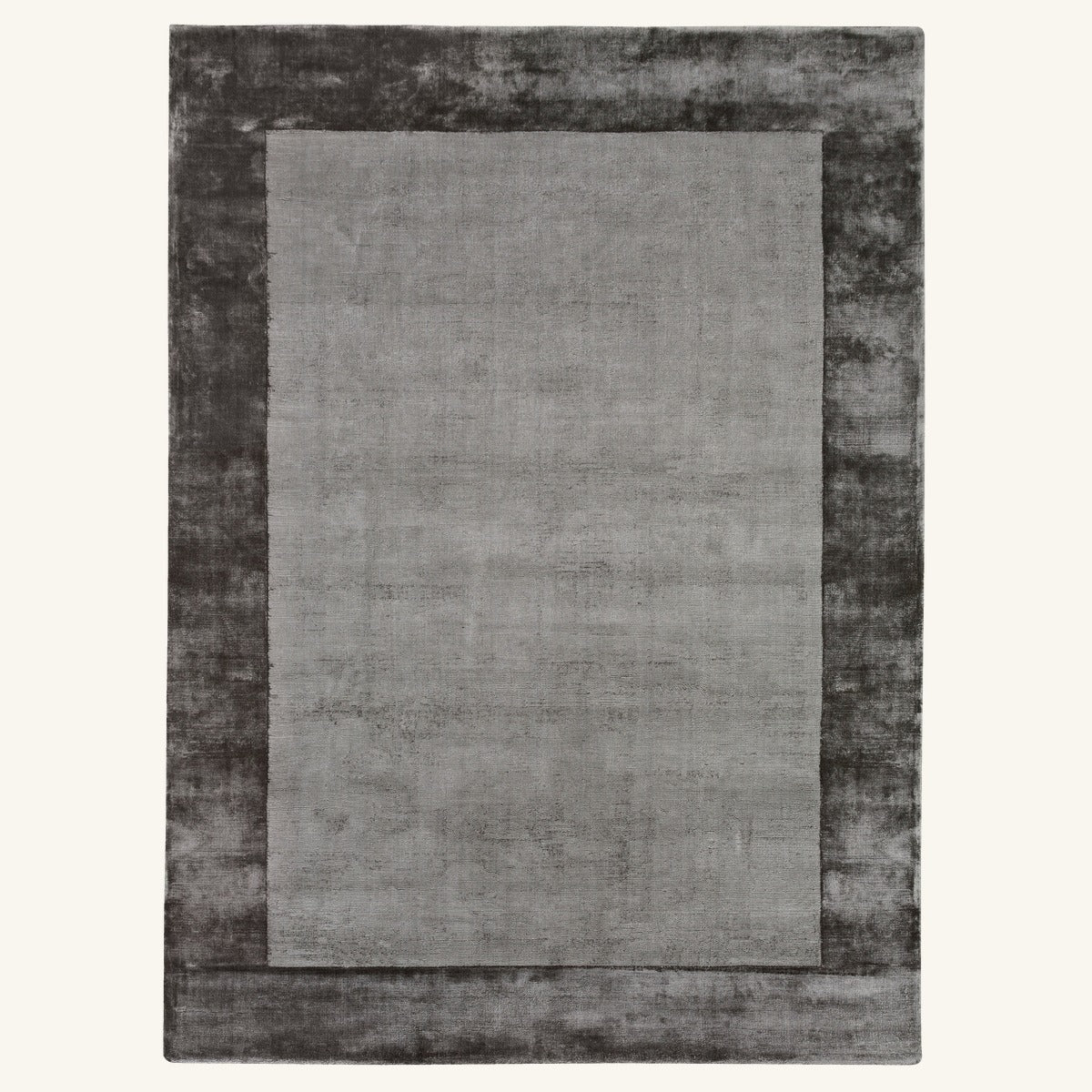 Tapis design en viscose gris - Aurelia - fond #F9F6F0 détouré