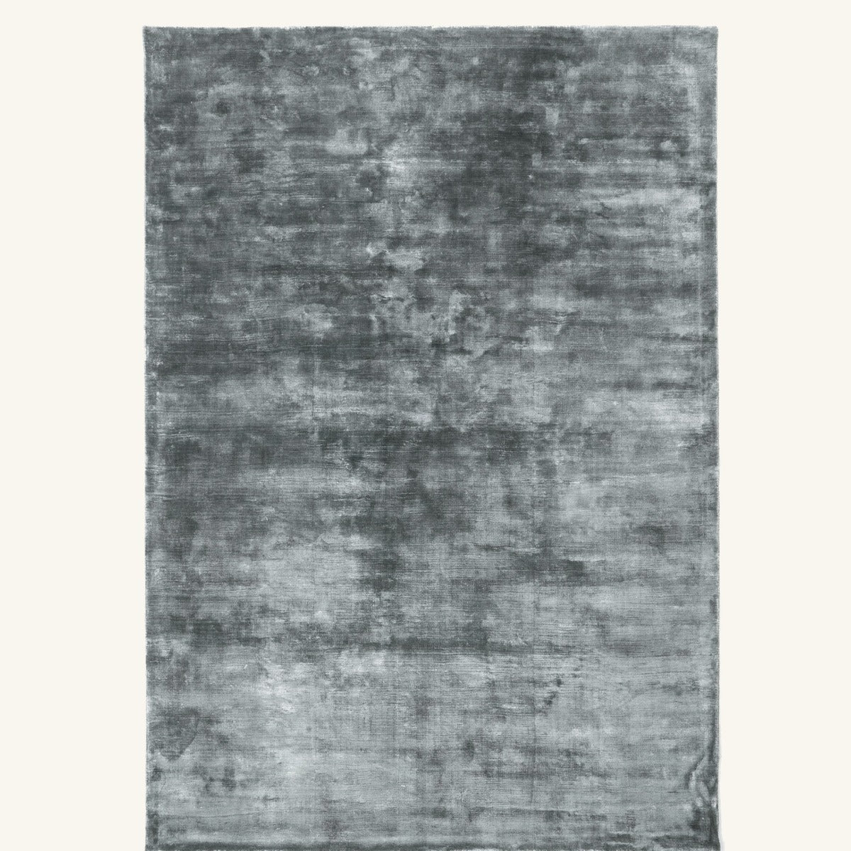 Tapis design en viscose gris - Campobasso - fond #F9F6F0 détouré