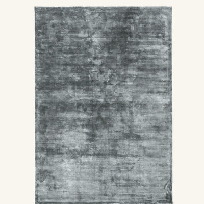 Tapis design en viscose gris - Campobasso - fond #F9F6F0 détouré