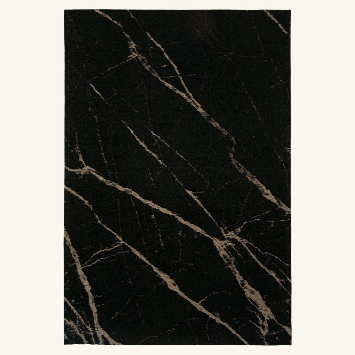 Tapis lavable effet pierre noir - Cortona - fond #F9F6F0 détouré