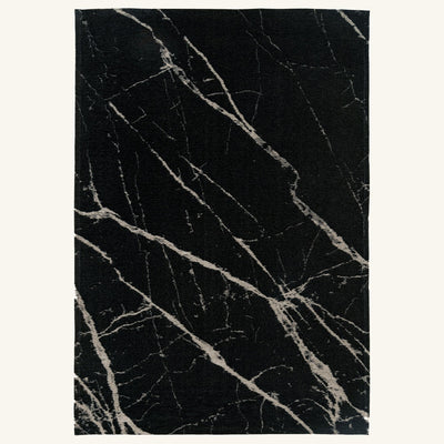Tapis lavable effet pierre noir - Lecce - fond #F9F6F0 détouré